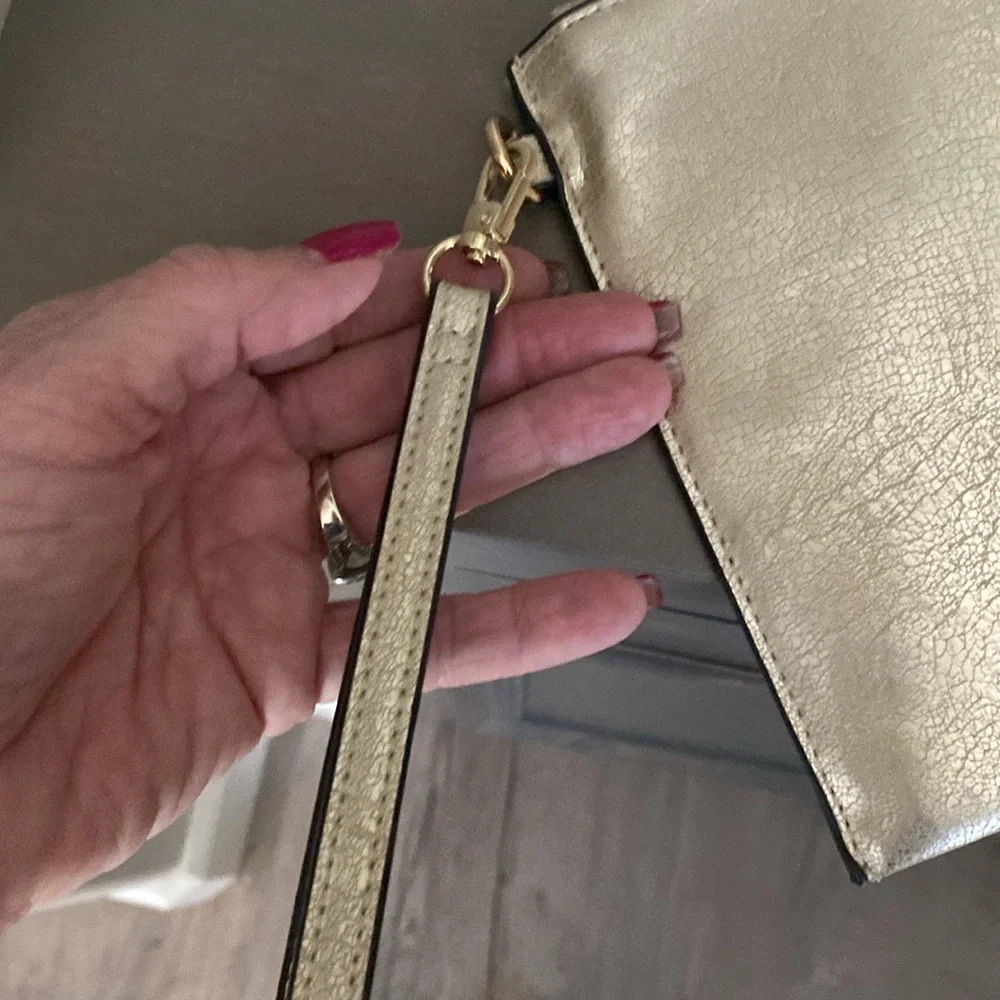 Gold wristlet clutch